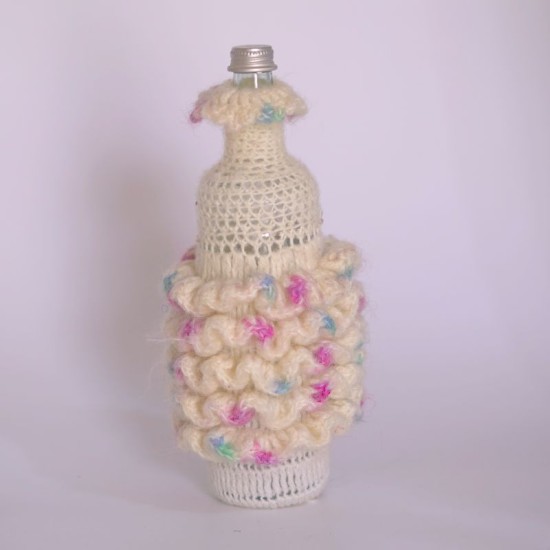 Décoration en crochet pour bouteille de géranium